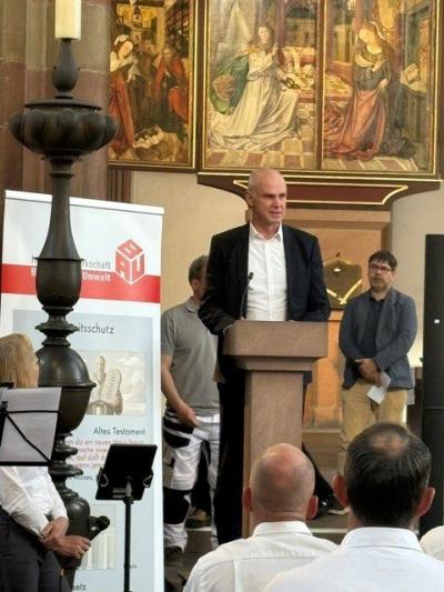 Michael Kirsch beim ökumenischen Gottesdienst zum Workers' Memorial Day 2026 in Würzburg